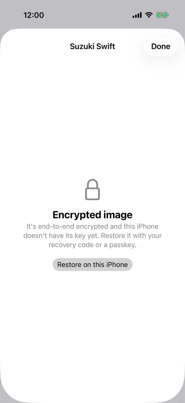 A registration card with Encrypted image and Restore on this iPhone