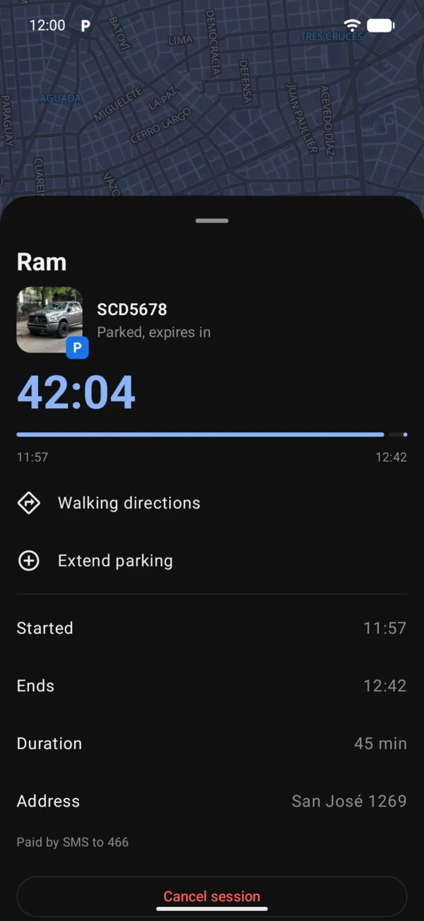 A parked vehicle with the time left, Walking directions and Extend parking