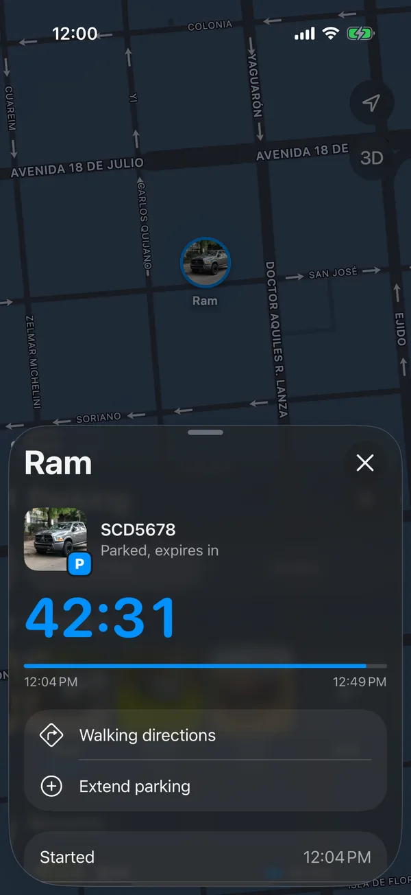 A parked vehicle with the time left, Walking directions and Extend parking