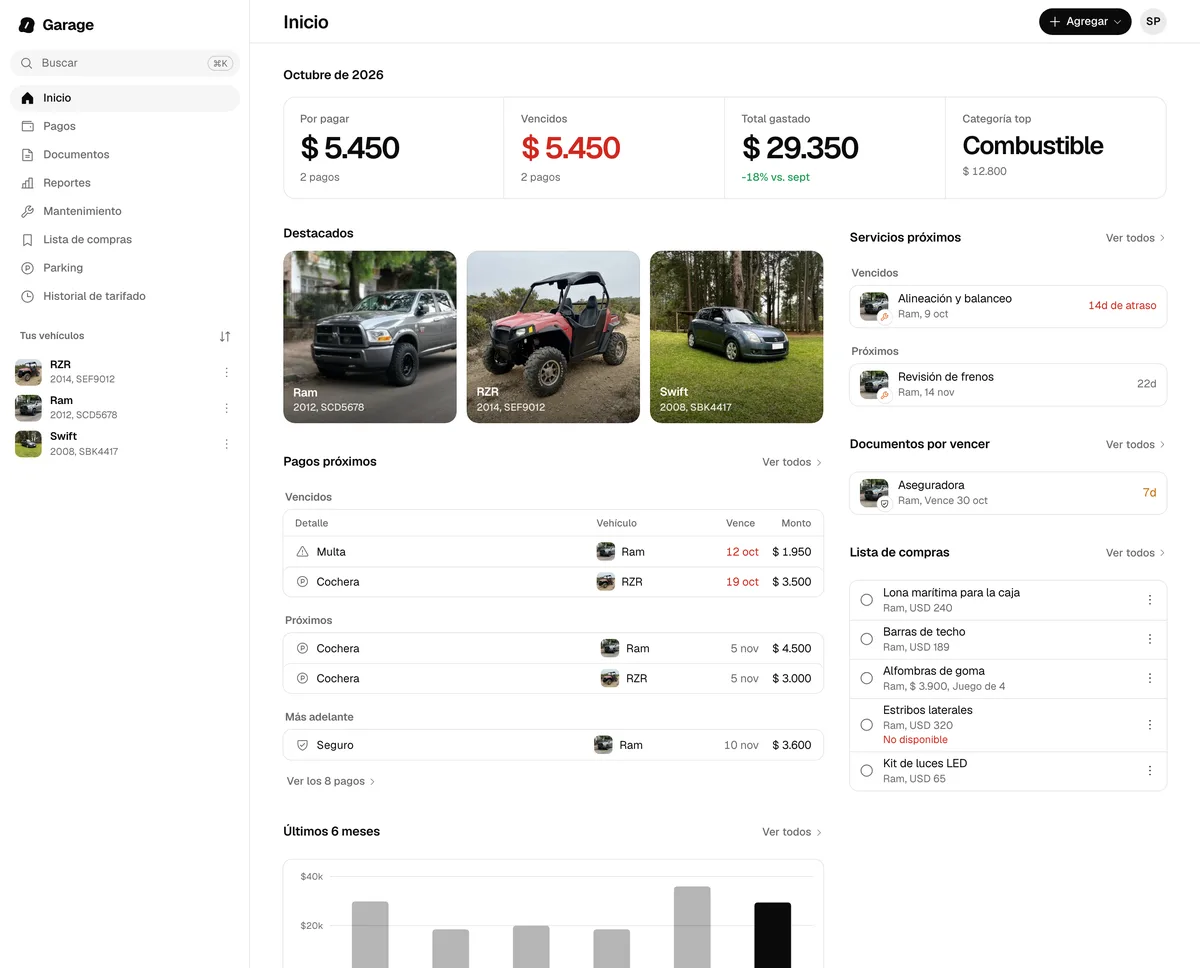 La pantalla de Inicio de GarageApp en la web, en una computadora, con el menú lateral y los vehículos